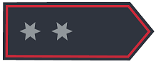 Schulterklappe in dunkelblauer Grundfarbe mit zwei sechszackigen Sternen in Silber, mittig in Reihe, Abzeichenumrandung in Rot