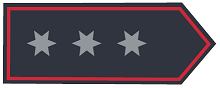 Schulterklappe in dunkelblauer Grundfarbe mit drei sechszackigen Sternen in Silber, mittig in Reihe, Abzeichenumrandung in Rot